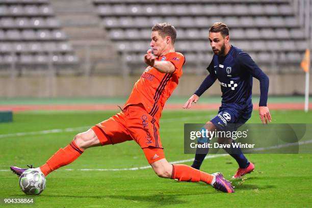 Antoine Ponroy of FBBP 01 and Julien Lopez of Paris FC during the Ligue 2 match between Paris FC and Bourg en Bresse at Stade Charlety on January 12,...