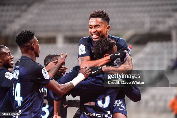 Dylan Saint Louis of Paris FC is mobbed after putting his side 1-0 ahead during the Ligue 2 match between Paris FC and Bourg en Bresse at Stade...