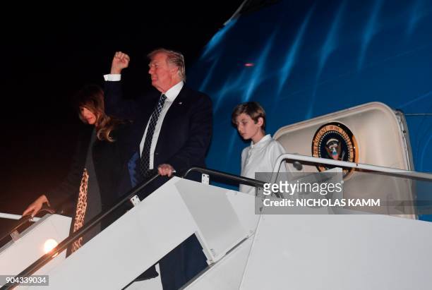 President Donald Trump, son Barron and wife Melania step off Air Force One upon arrival at Palm Beach International Airport in West Palm Beach,...