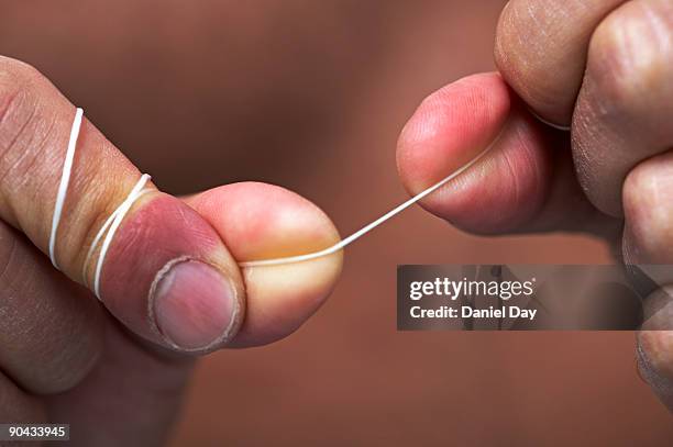 man flossing - dental floss stock pictures, royalty-free photos & images
