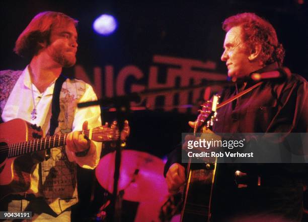 Johnny Cash performs on stage with his son John Carter Cash at the Nighttown in Rotterdam. Netherlands on June 30 1994.