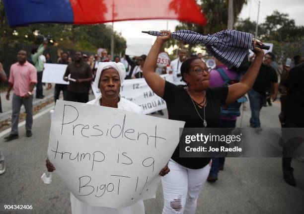 Jocelyne Pierre and Yanick Gorneo join with others to mark the 8th anniversary of the massive earthquake in Haiti and to condemn President Donald...