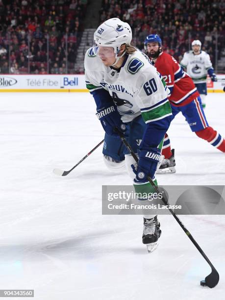 Markus Granlund of the Vancouver Canucks passes the puck against the Montreal Canadiens in the NHL game at the Bell Centre on January 7, 2018 in...