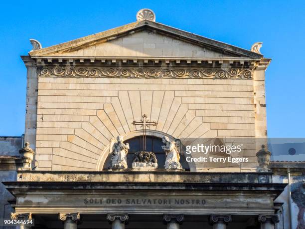 the upper facade portion of the chiesa del santissimo crocifisso majorana. (church of the most holy crucifix majorana) - crocifisso stock pictures, royalty-free photos & images