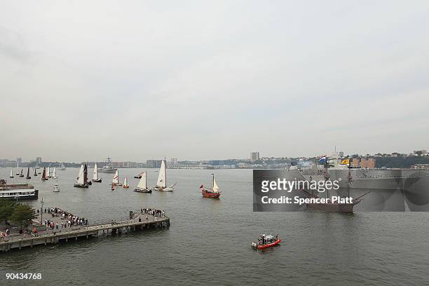 Flotilla of 11 ships comprised of Dutch Naval Frigates, NATO vessels, Dutch barges, and a replica of Henry Hudson�s "Half Moon" sail past the USS...