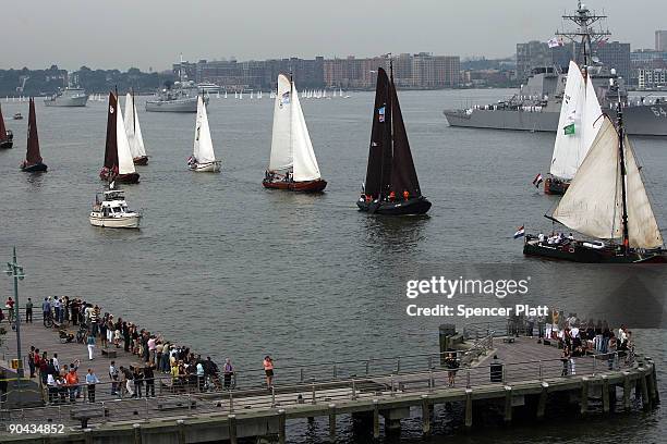 Flotilla of 11 ships comprised of Dutch Naval Frigates, NATO vessels, Dutch barges, and a replica of Henry Hudson�s "Half Moon" sail past the USS...