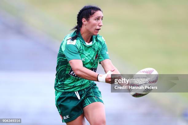 Sarah Goss of Manawatu makes a break during the Bayleys National Sevens match between Manawatu and Wellington at Rotorua International Stadium on...