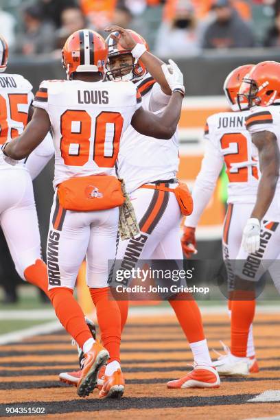 DeShone Kizer of the Cleveland Browns celebrates a touchdown with teammate Ricardo Louis during their game against the Cincinnati Bengals at Paul...