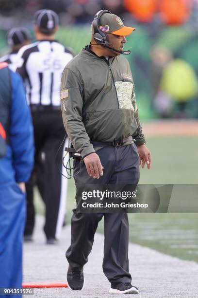 Head Coach Marvin Lewis of the Cincinnati Bengals watches his team from the sidelines during the game against the Cleveland Browns at Paul Brown...