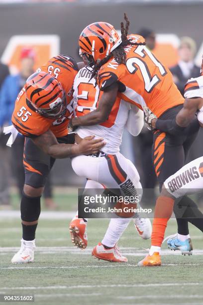 Vontaze Burfict and Dre Kirkpatrick of the Cincinnati Bengals make the tackle on Duke Johnson Jr. #29 of the Cleveland Browns during their game at...