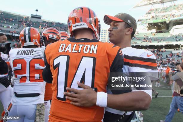 Andy Dalton of the Cincinnati Bengals shares a moment with DeShone Kizer of the Cleveland Browns during their game at Paul Brown Stadium on November...