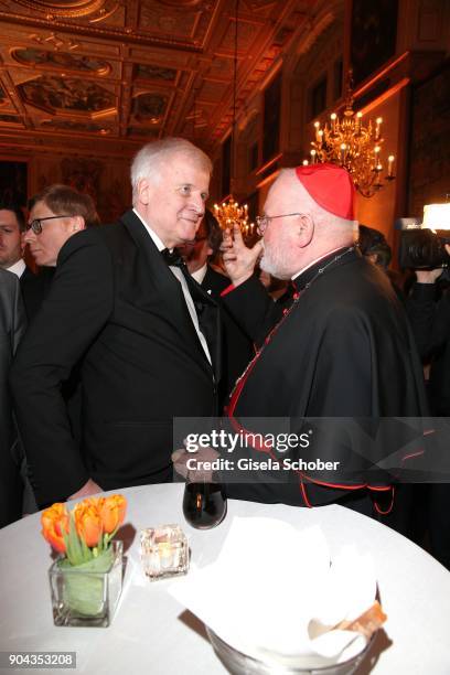 Prime minister of Bavaria Horst Seehofer and bishop Reinhard Marx during the new year reception of the Bavarian state government at Residenz on...