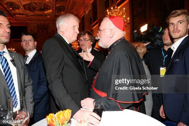 Prime minister of Bavaria Horst Seehofer and bishop Reinhard Marx during the new year reception of the Bavarian state government at Residenz on...