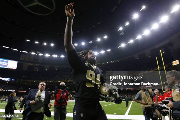 Cameron Jordan of the New Orleans Saints celebrates the NFC Wild Card playoff game against the Carolina Panthers at the Mercedes-Benz Superdome on...