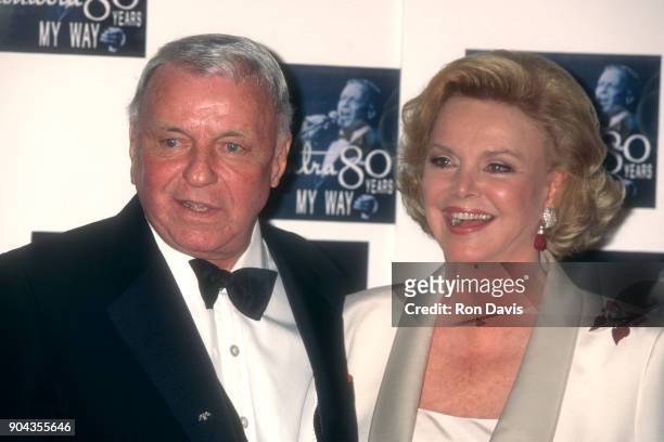 Legendary American singer Frank Sinatra poses with his wife Barbara for photographers shortly after a star studded event to honor his 80th birthday...