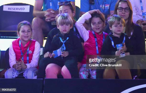 Myla Rose Federer,Charlene Riva Federer,Lenny Federer and Leo Federer watch their father Roger Federer during Tennis Australia's Annual Kids Day...