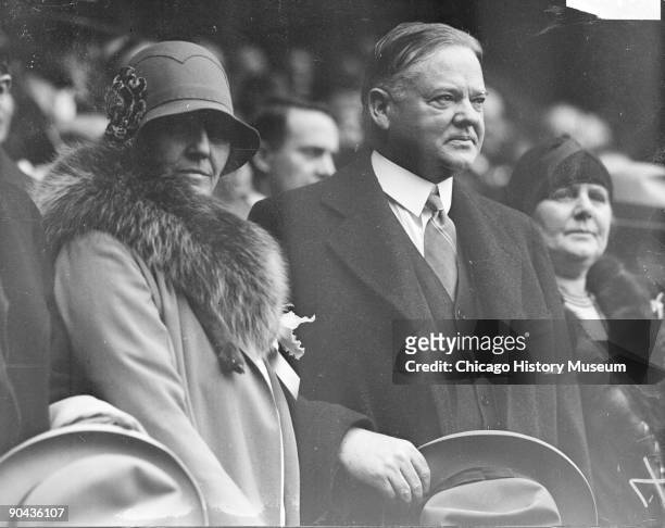 Informal half-length portrait of Herbert Hoover, Secretary of Commerce from 1921-1928 and President of the United States from 1929-1933, and his...