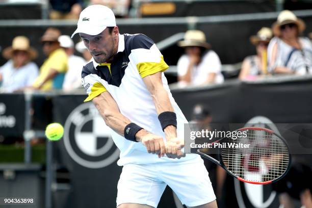 Roberto Bautista Agut of Spain plays a backhand in his Mens Singles Final match against Juan Martin Del Potro of Argentina during day six of the ASB...