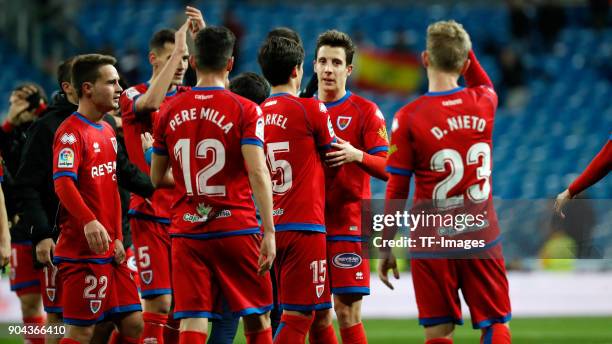 The team of Numancia celebrates after the Spanish Copa del Rey match between Real Madrid and Numancia at Santiago Bernabeu on January 10, 2018 in...