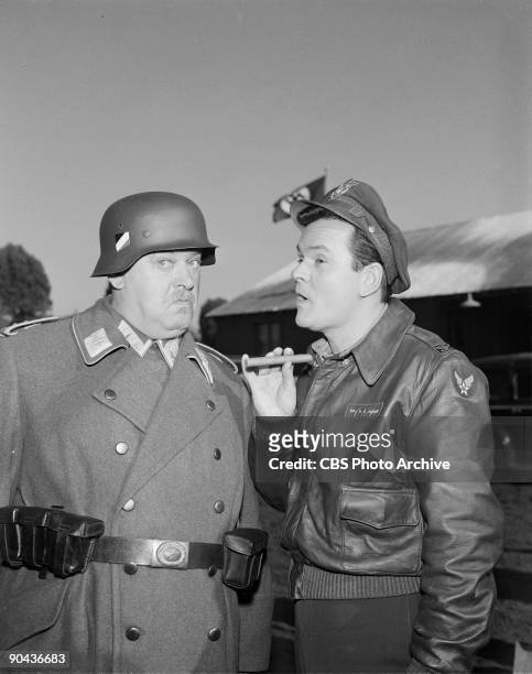 John Banner as Sgt. Hans Georg Schultz, left, and Bob Crane as Col. Robert E. Hogan in the show�s pilot, January 11, 1965.