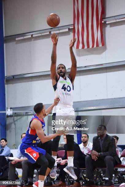 Shawne Williams of the Iowa Wolves shoots the ball against the Grand Rapids Drive NBA G League Showcase Game 20 between the Grand Rapids Drive and...