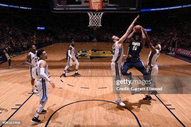 Kenneth Faried of the Denver Nuggets goes to the basket against the Memphis Grizzlies on January 12, 2018 at the Pepsi Center in Denver, Colorado....
