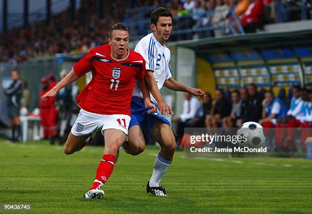 Tom Cleverley of England battles with Leonidas Argyropoulos of Greece during the UEFA U21 Championship match between Greece and England at the...