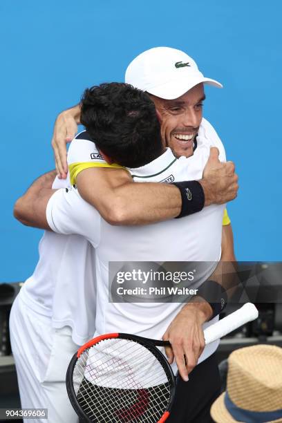 Roberto Bautista Agut of Spain hugs his team following his Mens Singles Final win over Juan Martin Del Potro of Argentina during day six of the ASB...