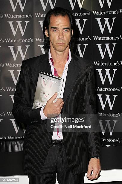 Nick Cave poses at his book signing for 'The Death of Bunny Munro' on September 8, 2009 in London, England.