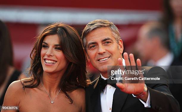 Actor George Clooney and his girlfriend Elisabetta Canalis arrive at the Excelsior for "The Men Who Stare At Goats" premiere at the Sala Grande...