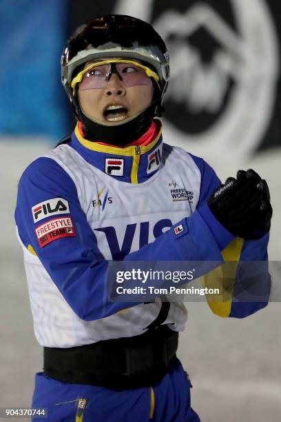 Mengtao Xu of China celebrates after a jump during in the Ladies' Aerials Finals during the 2018 FIS Freestyle Ski World Cup at Deer Valley Resort on...