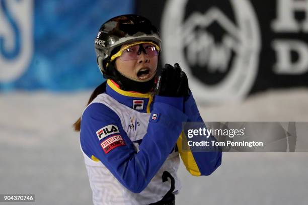 Mengtao Xu of China celebrates after a jump during in the Ladies' Aerials Finals during the 2018 FIS Freestyle Ski World Cup at Deer Valley Resort on...