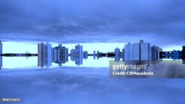 city reflected. - crmacedonio stock-fotos und bilder