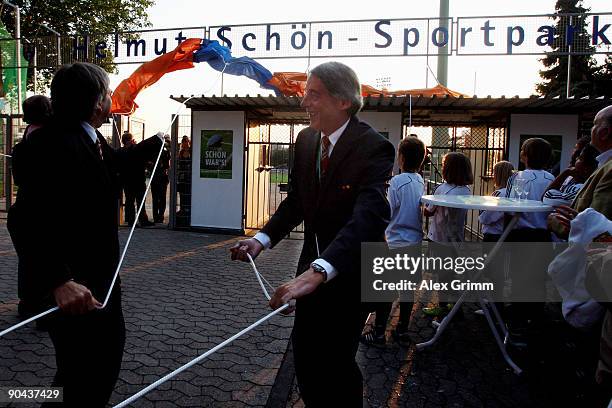 Wiesbaden's lord mayer Helmut Mueller and Rolf Hocke, vice president of the German Football Association , unveile the name of the Helmut Schoen...