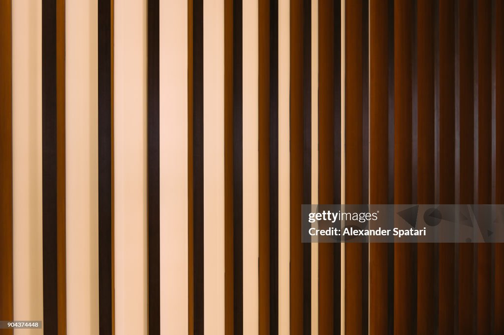 Gold colored abstract striped architectural detail