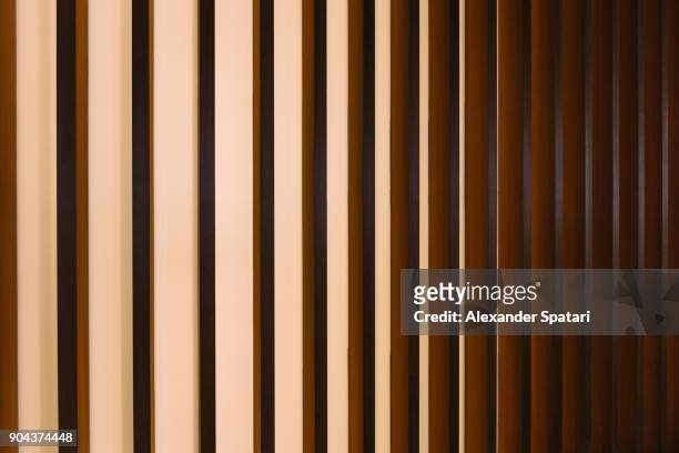 gold colored abstract striped architectural detail - wall building feature stock pictures, royalty-free photos & images