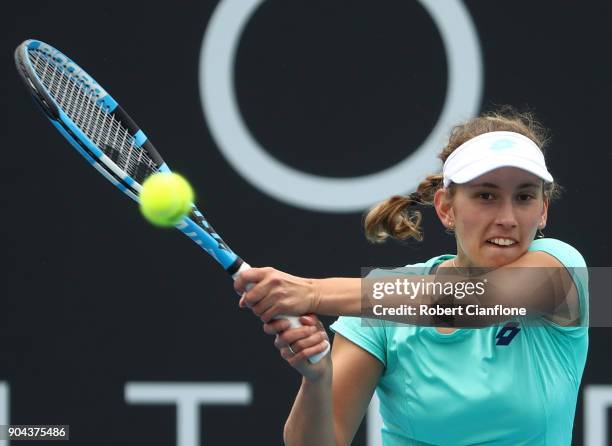 Elise Mertens of Belgium plays a backhand during her finals match against Mihaela Buzarnescu of Romania during the 2018 Hobart International at...
