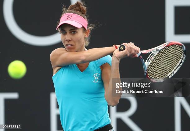Mihaela Buzarnescu of Romania returns a shot during her finals match against Elise Mertens of Belgium during the 2018 Hobart International at Domain...