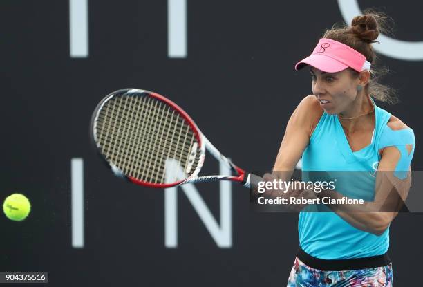 Mihaela Buzarnescu of Romania returns a shot during her finals match against Elise Mertens of Belgium during the 2018 Hobart International at Domain...