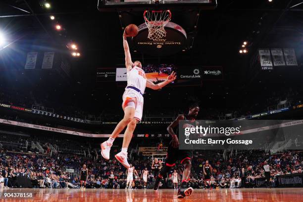 Alec Peters of the Phoenix Suns shoots the ball during the game against the Houston Rockets on January 12, 2018 at Talking Stick Resort Arena in...