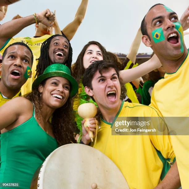 Brazilin Fans Brazilian Football Fans Dancing And Cheering High-Res Stock Photo ...
