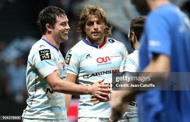 Henry Chavancy of Racing 92 celebrates scoring a try with Dimitri Szarzewski during the Top 14 rugby match between Racing 92 and ASM Clermont...