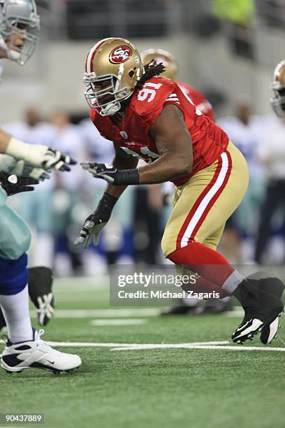 Ray McDonald of the San Francisco 49ers rushes the quarterback during the preseason game against the Dallas Cowboys at Cowboys Stadium on August 29,...