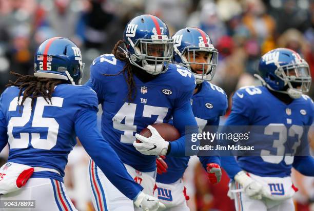 Kelvin Sheppard of the New York Giants in action against the Washington Redskins on December 31, 2017 at MetLife Stadium in East Rutherford, New...