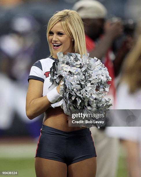 Houston Texans cheerleader performs during a break in the game against the Minnesota Vikings at Reliant Stadium on August 31, 2009 in Houston, Texas.