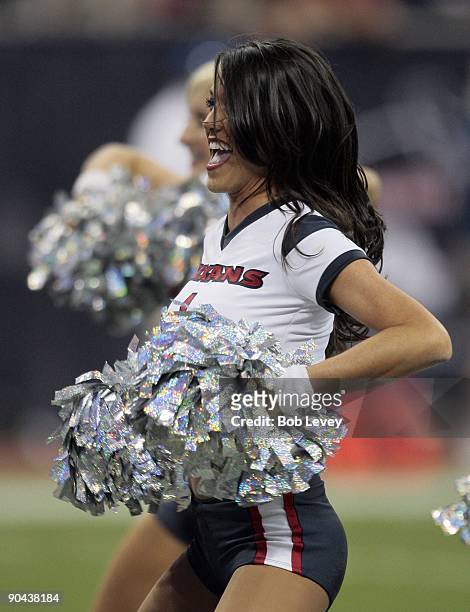 Houston Texans cheerleader performs during a break in the game against the Minnesota Vikings at Reliant Stadium on August 31, 2009 in Houston, Texas.
