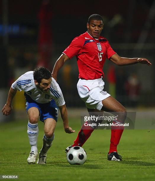 Miles Addison of England and Michail Boukouvalas of Greece in action during the UEFA U21 Championship match between Greece and England at the Asteras...