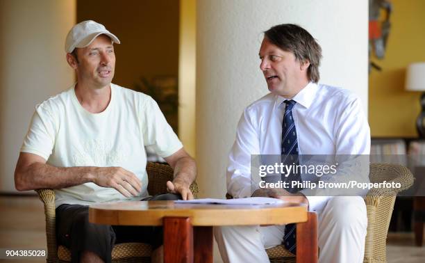 Former England cricketer Nasser Hussain talks with ECB chairman Giles Clarke for the Daily Mail at the Hilton Hotel before the 4th Test match between...