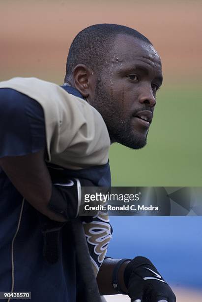 Tony Gwynn Jr. #18 of the San Diego Padres Padres looks on batting practice before an MLB game against the Florida Marlins at Landshark Stadium on...