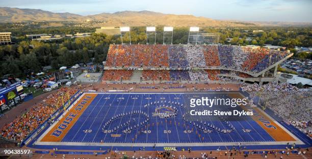 The sun lights the foothills of Boise in this overhead shot of Bronco Stadium before the start of the game between the Oregon Ducks and the Boise...